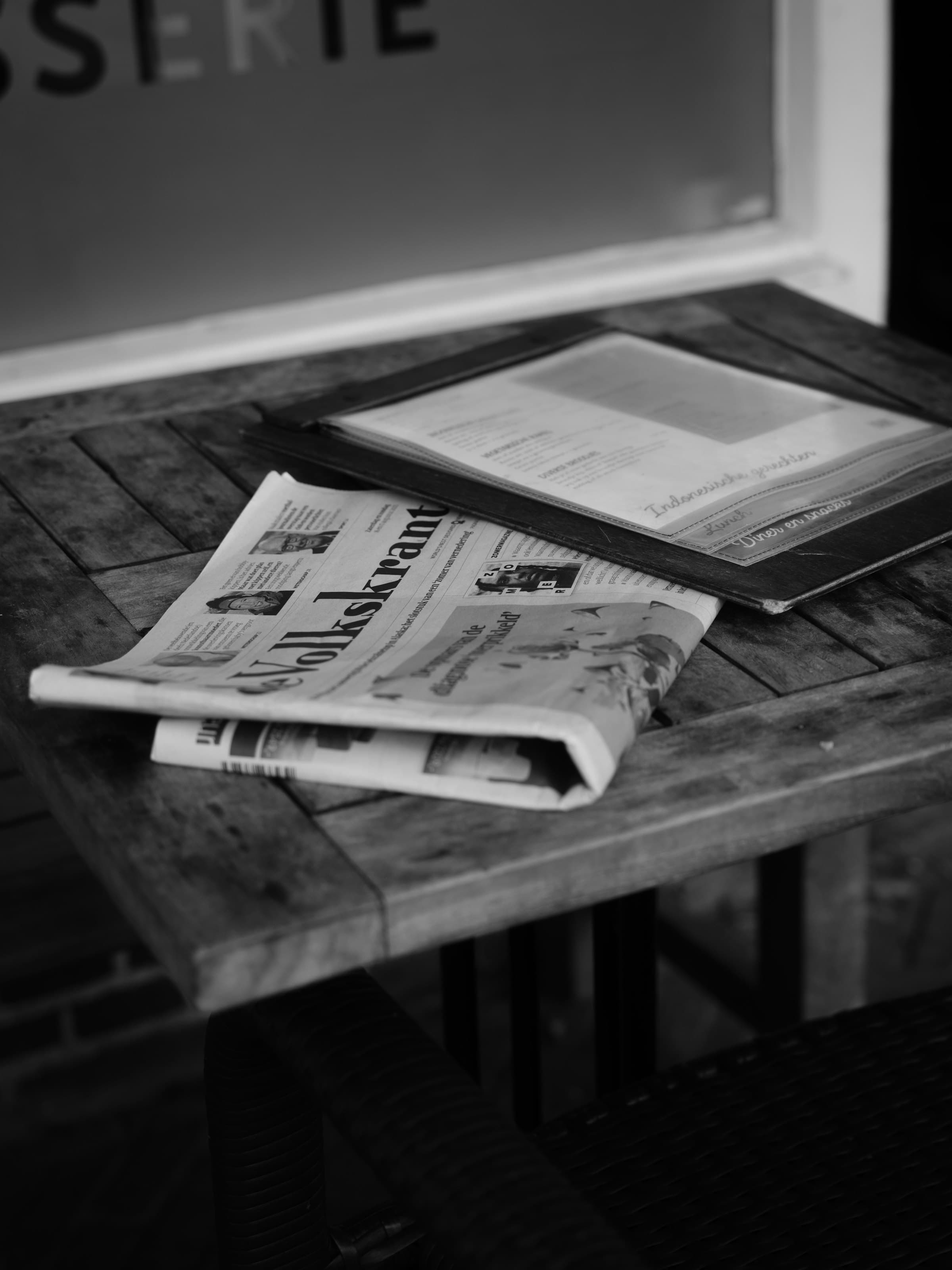 Folded paper on a wooden table